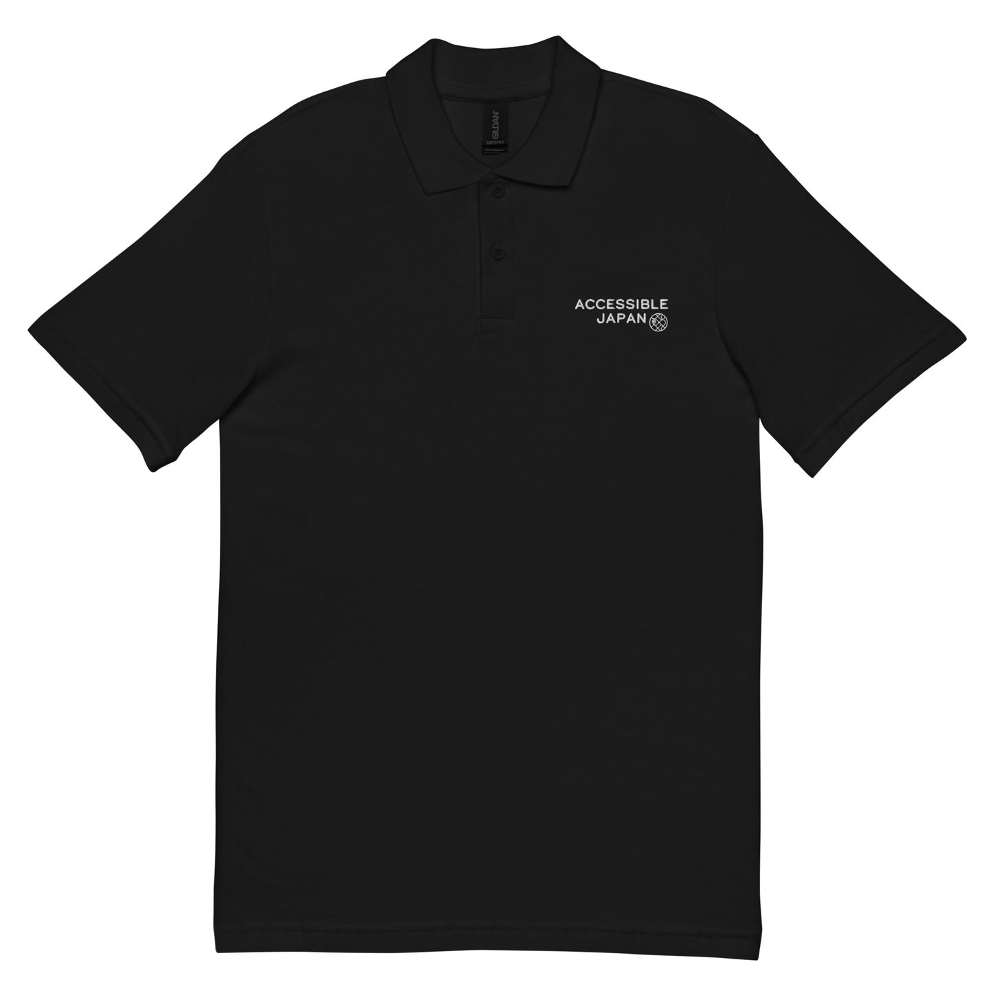 A black polo shirt featuring the "Accessible Japan" logo in white on the left chest, with a buttoned collar.