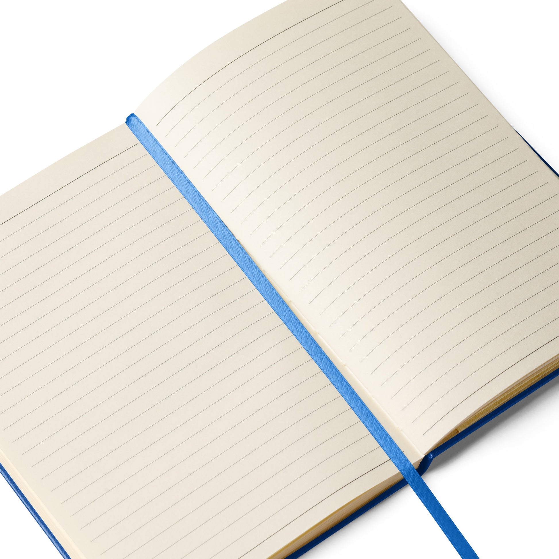 An open notebook displaying lined cream-colored pages with a white ribbon bookmark running down the center.