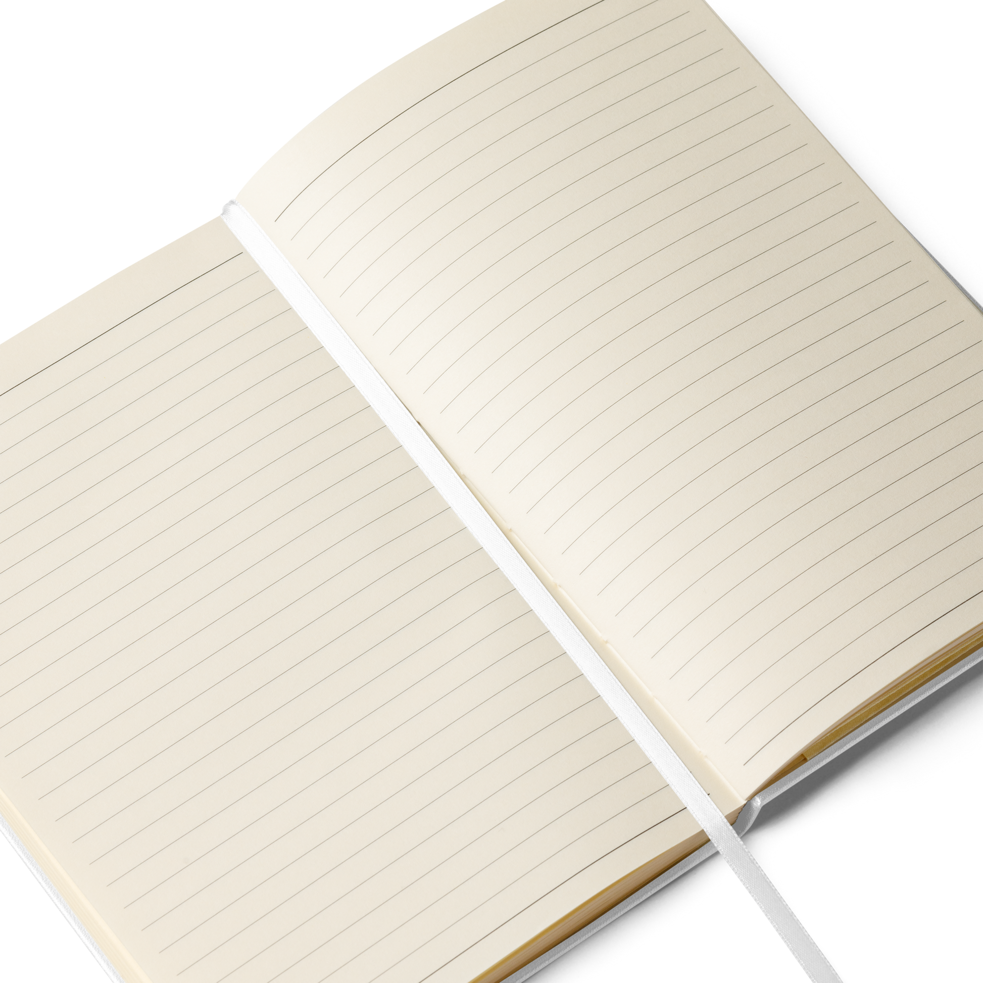 An open notebook displaying lined cream-colored pages with a white ribbon bookmark running down the center.